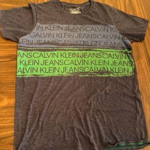 T-shirt, Calvin Klein jeans XL-tall orange, and gray in color